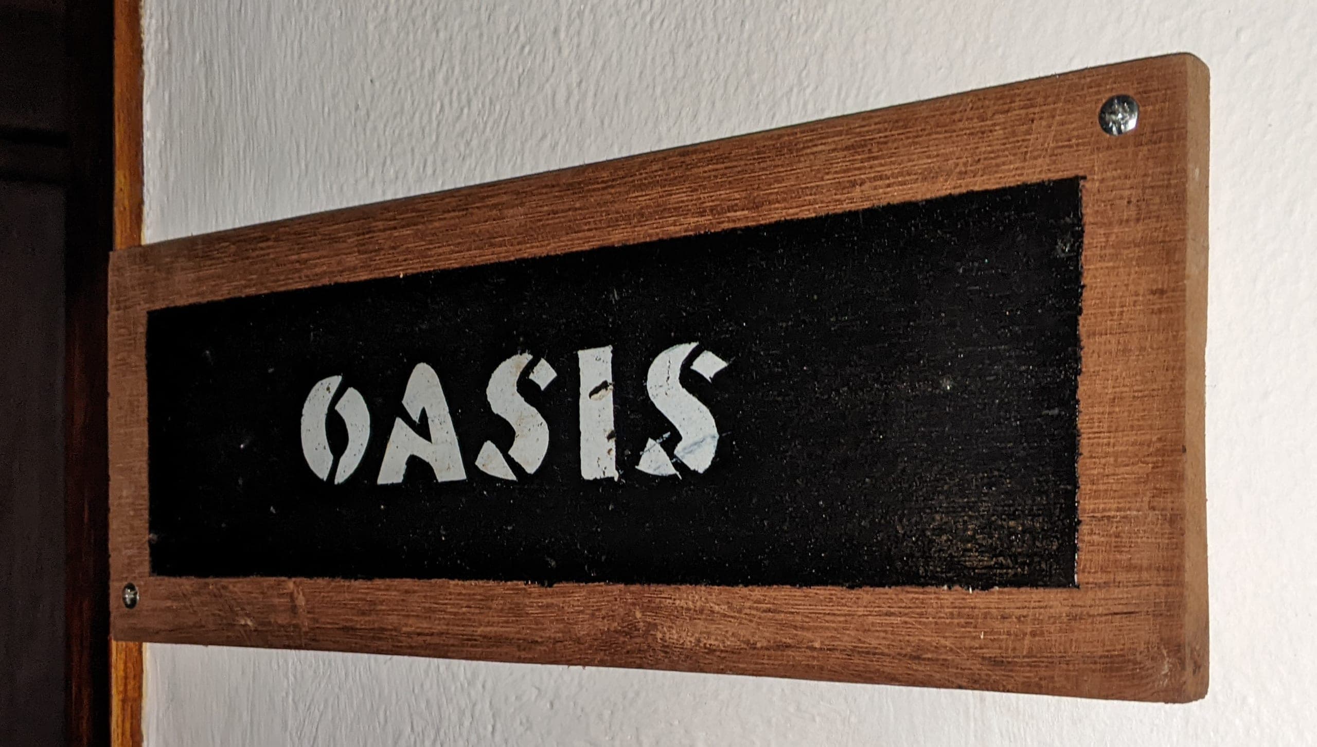 Oasis room entrance plaque